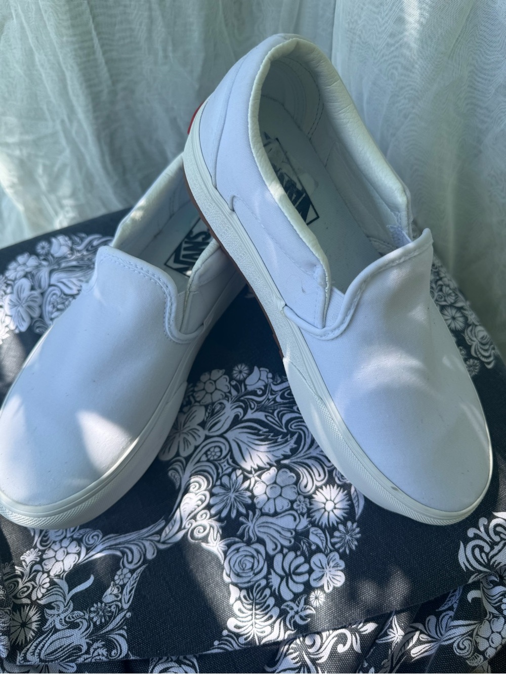Vans White Canvas Slip-On Sneakers